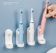 Wall-Mounted Electric Toothbrush Holder — Traceless ABS Stand, Fits Most Electric Brushes